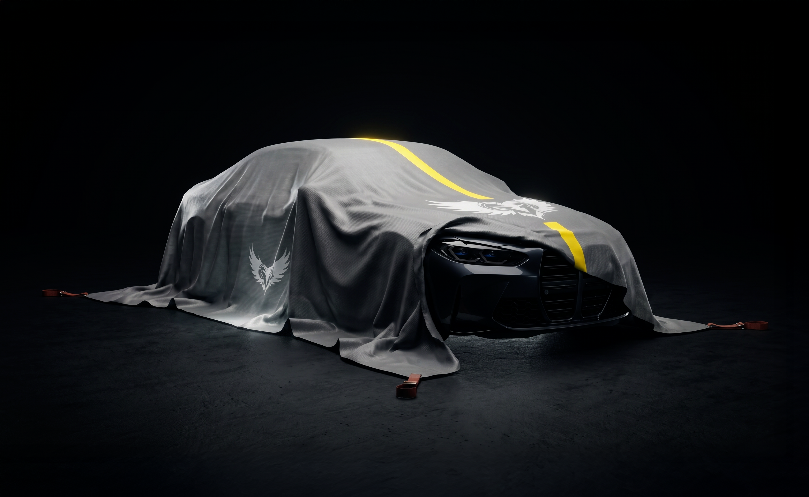 Golden Fleece EV thermal containment blanket draped over a sedan in a dark cinematic studio — the iconic yellow alignment stripe and ram-and-wings brand mark visible against deep black background.