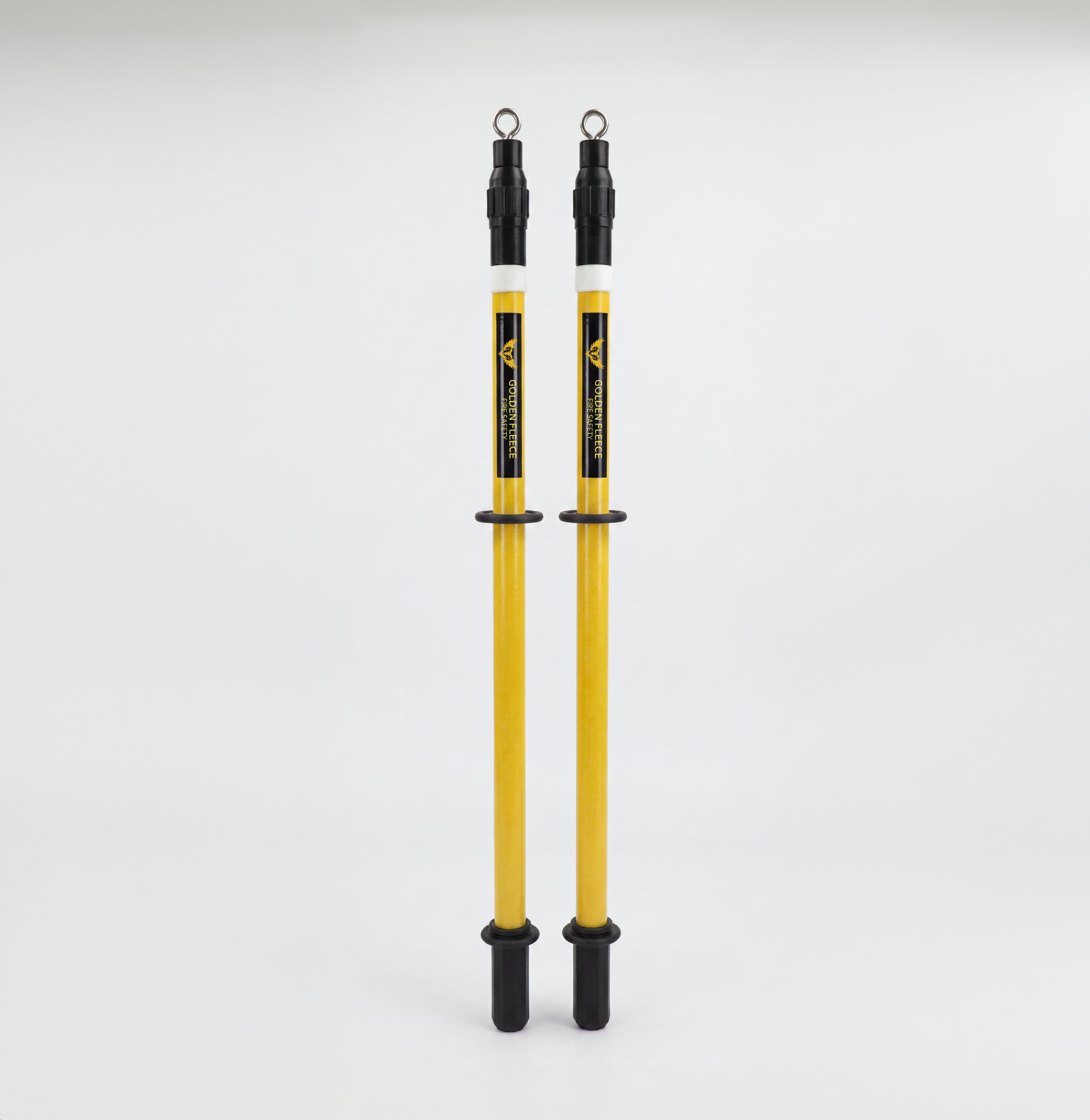 Pair of yellow Golden Fleece Fire Safety EV containment blanket deployment poles — telescopic poles with hooked ends for spreading the blanket from a safe distance.